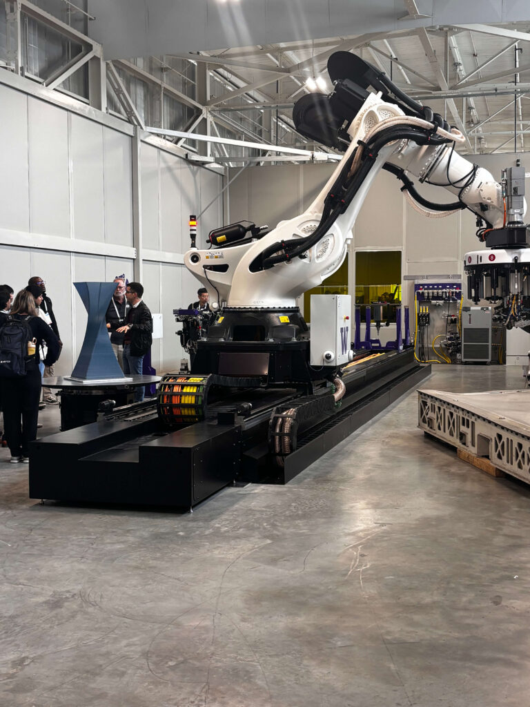 Side view of large piece of robotic equipment with logo on front that reads Radian Aerospace.